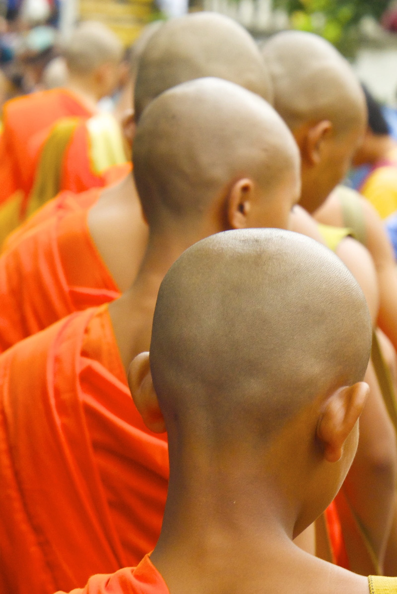 human representation, real people, alm, day, people, lining, multi colored, lao, childhood, large group of objects, for sale, male, prayer, head, monk