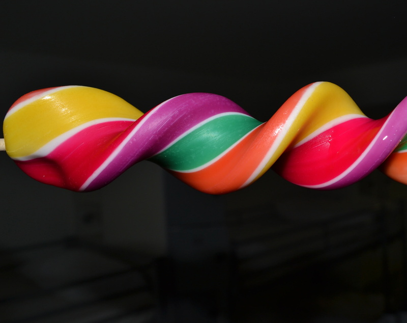 Lollipop, large group of objects, indoors, group of objects, neon colored, vibrant color, Colorful, color, candy, no people, multi colored, freshness, black background