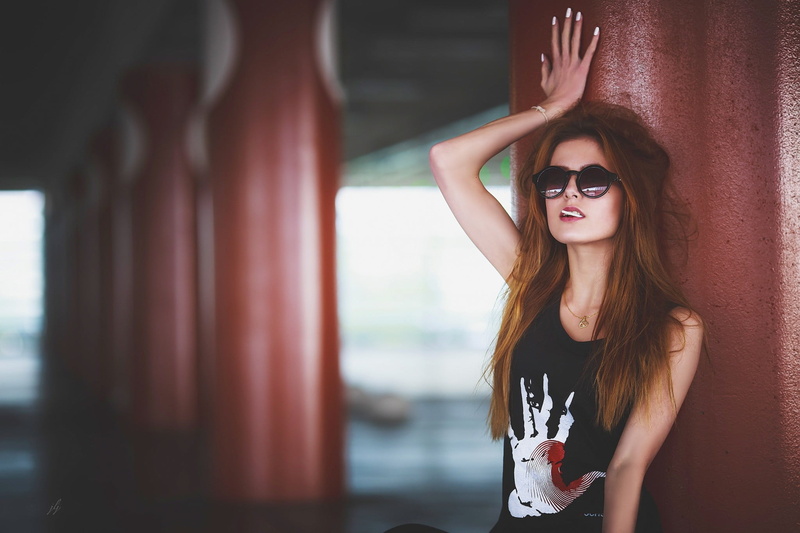 young adult, smiling, architectural column, beauty, hairstyle, lifestyles, long hair, portrait, sunglasses, young women, redhead, glasses, fashion, standing