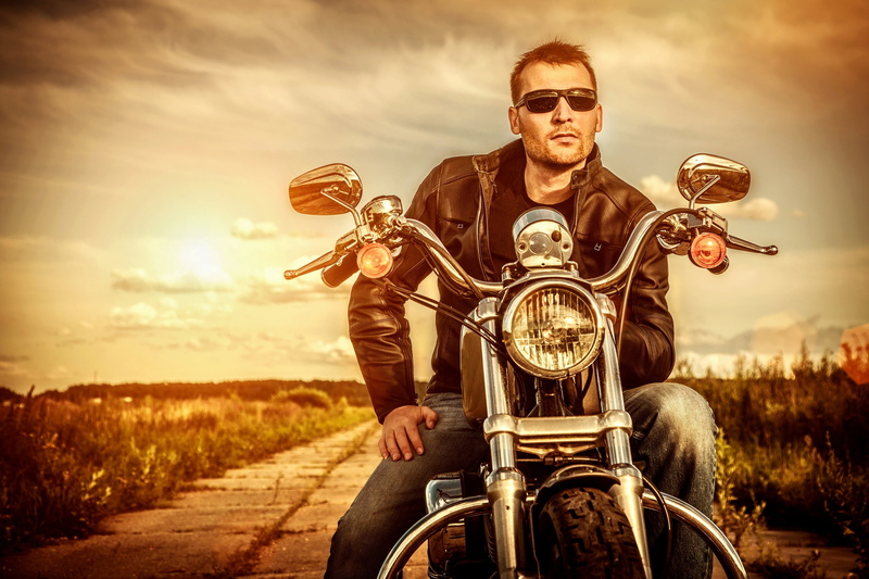 road, fashion, adult, jacket, leisure activity, motorcycle, men, leather, ride, sky, transportation, riding, front view, outdoors, helmet, cloud - sky