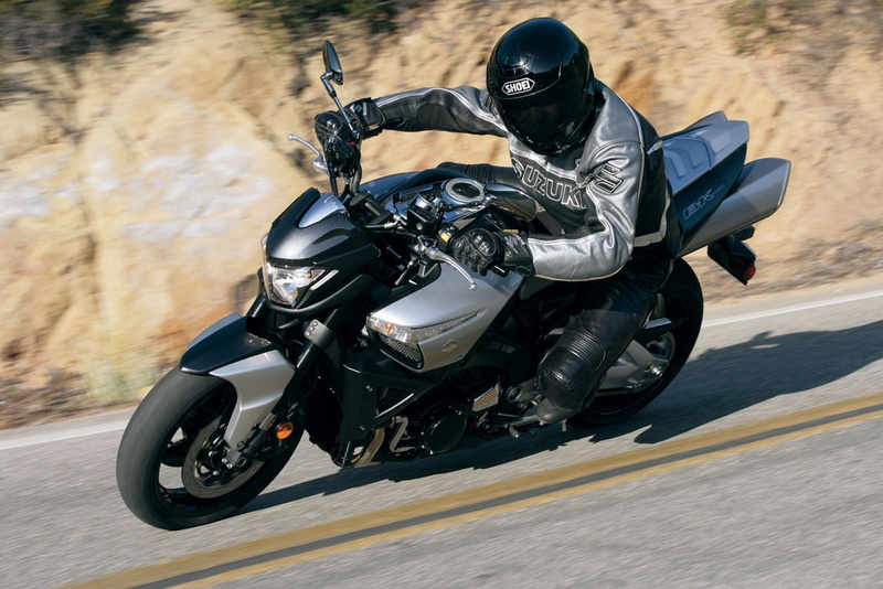 Suzuki, one person, motorcycle, crash helmet, motion, road, mode of transportation, helmet, GSR, clothing, outdoors, men, transportation, sports helmet