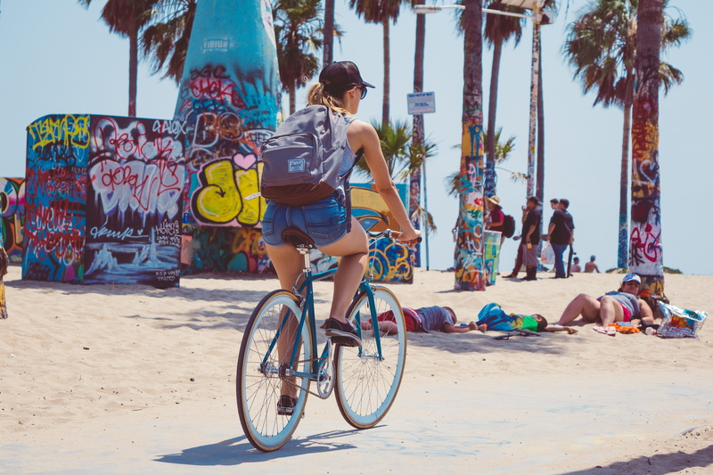one person, bike, full length, men, palm tree, leisure, bike ride, transportation, tree, tropical climate, girl, sunlight, beach, activity, bicycle, outdoors