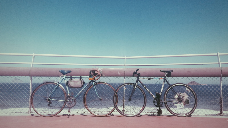 sky, sea, mode of transportation, day, seafront, copy space, rio de janeiro, parking, road, waterfront, track bike, bicycle, transportation, stationary