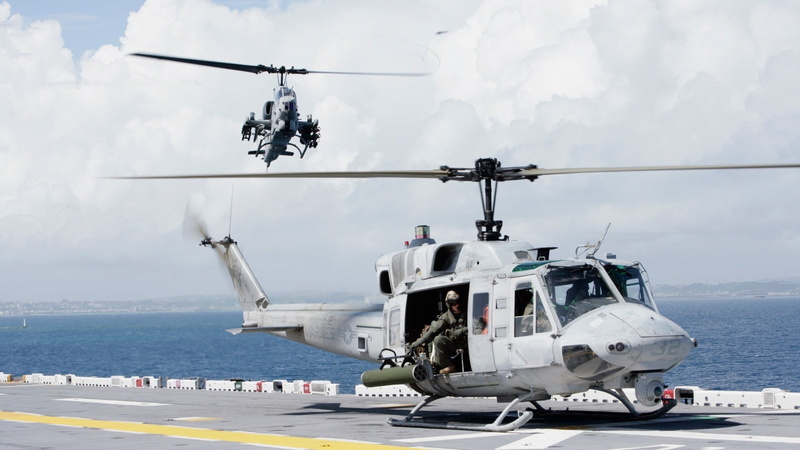 military, water, sky, propeller, group of people, Bell AH-1, airplane, nautical vessel, outdoors, Bell UH-1N, gray, cloud - sky, sailor, helicopter, day