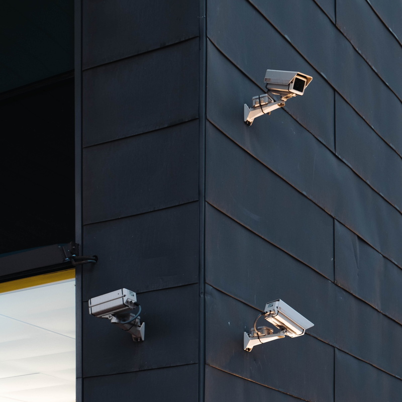 white, outdoors, wall, bullet, three, technology, building exterior, building, camera, wall - building feature, cameras, security, day, security system