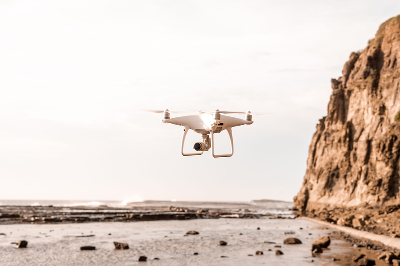 transportation, white, wireless technology, airplane, browns, near, dji, phantom 4, security, australia drone, rock - object, warm, outdoors, vehicle, landing