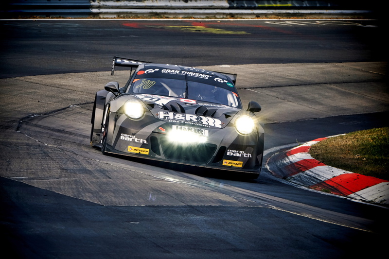 illuminated, road, day, motor racing track, sign, vln, on the move, communication, competition, speed, city, car racing, lighting equipment, mode of transportation