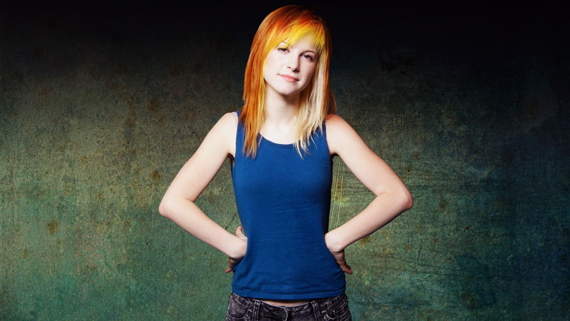 front view, looking at camera, teenager, singer, hairstyle, young adult, celebrity, one person, fashion, hair, long hair, jeans, hayley, williams, bangs