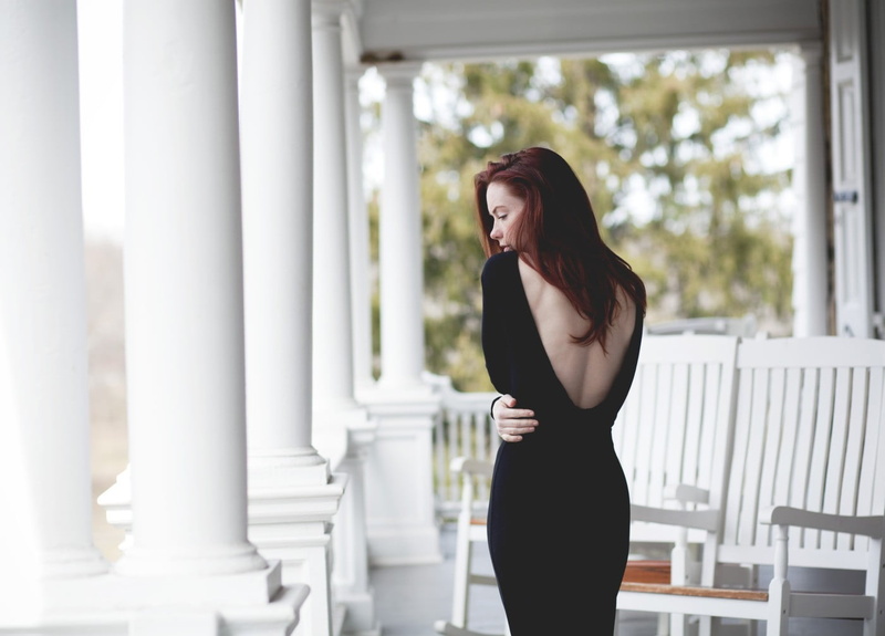 hairstyle, young adult, adult, young women, black dress, lifestyles, beauty, architectural column, architecture, women, hair, standing, real people, looking