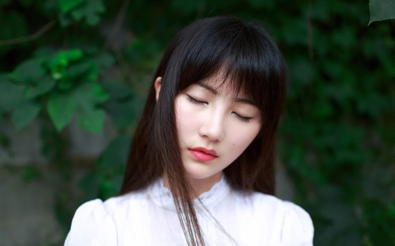 portrait, long hair, bangs, straight hair, outdoors, beautiful woman, focus on foreground, black hair, one person, medium-length hair, contemplation