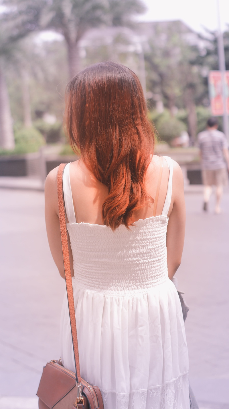 cool, long hair, fashion, real people, women, three quarter length, focus on foreground, casual clothing, people, sad, day, 5K, lifestyles, leisure activity