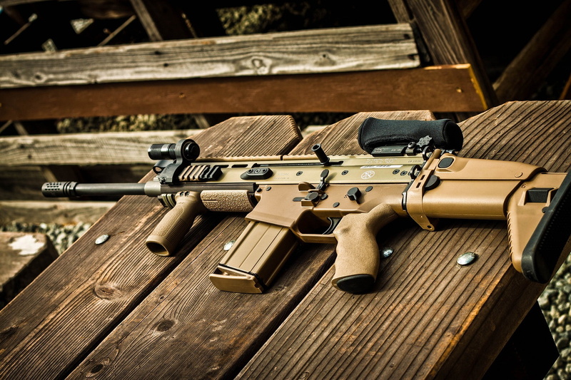 high angle view, brown, optics, focus on foreground, ammunition, army, machine, tree, weapon, weapons, machine gun, shooting A Weapon, sniper, foregrip