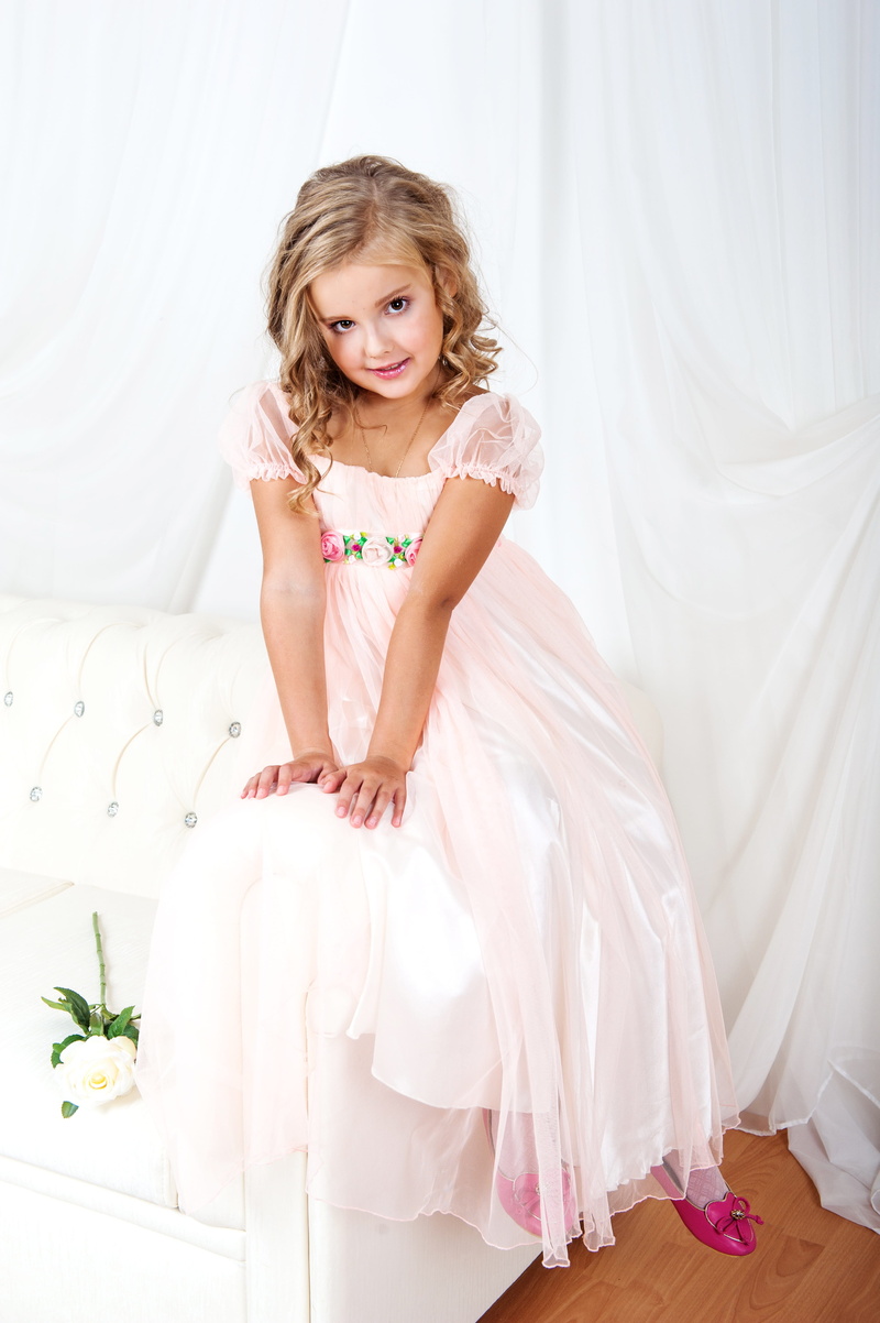 girls, front view, lifestyles, hairstyle, dress, cute, celebration, females, glamour, smiling, person, sitting, child, fashion, looking at camera, furniture