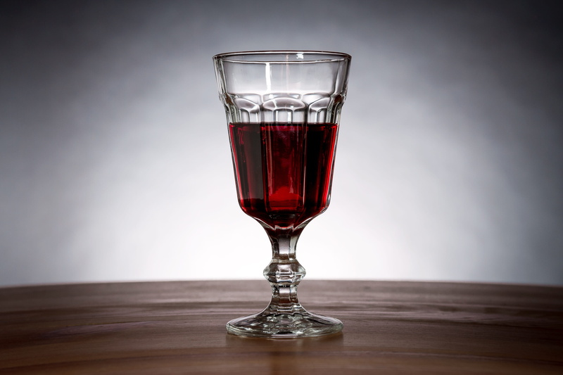 glass - material, wine glass, cocktail, glass, wine, liquor, beverage, no people, champagne, close-up, food and drink, household equipment, wood grain