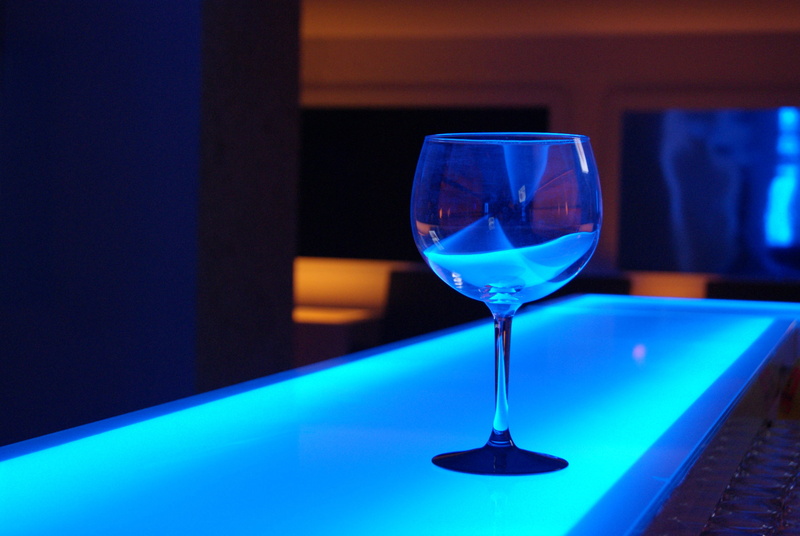 wine glass, restaurant, alcohol, bar, long, household equipment, no people, drink, focus on foreground, wine, blue, refreshment, nightlife, beverage, stem
