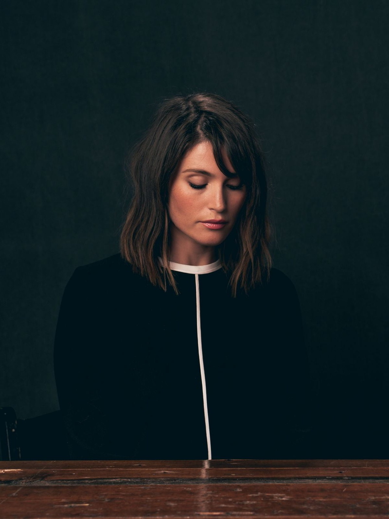 teenager, Gemma Arterton, looking, portrait, sitting, table, young women, hair, black background, women, young adult, actress, depression - sadness, Hollywood