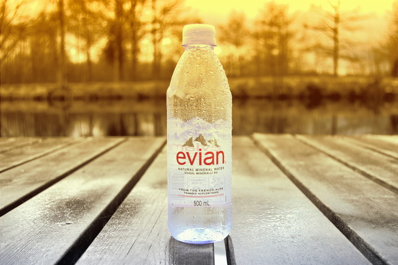 close-up, milk bottle, cold temperature, outdoors, container, still, text, cold drink, glass - material, liquid, focus on foreground, evian, drink, bottle