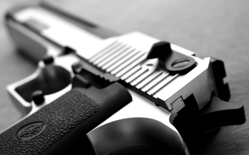no people, in a row, Desert Eagle, technology, focus on foreground, equipment, violence, close-up, still life, weapon, high angle view, handgun, indoors
