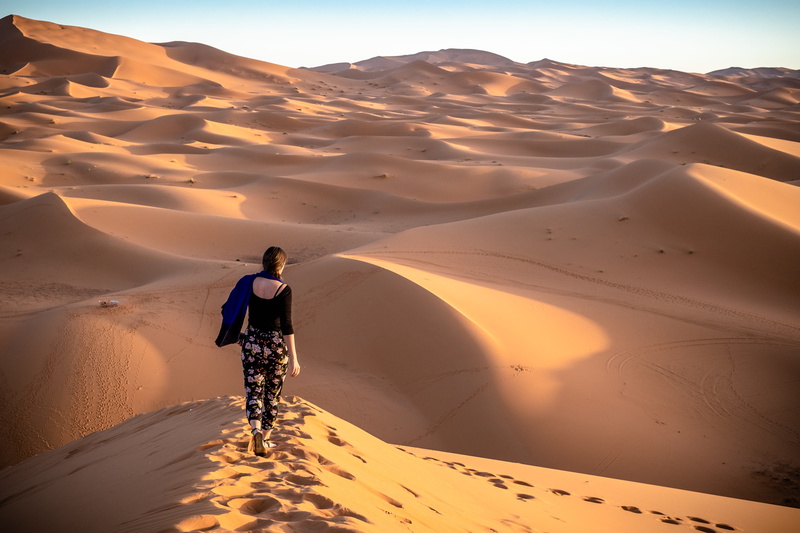 vehicle, environment, sand, real people, lifestyles, morocco, sunrise, beauty in nature, merzouga, human, landscape, sunlight, tranquil scene, sunset, arid climate