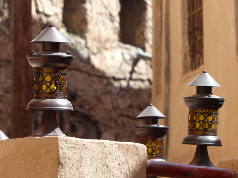 outdoors, 4K, electric lamp, day, religion, village, lighting equipment, still life, spirituality, container, place of worship, no people, sunlight, close-up