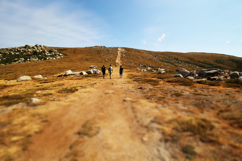landscape, adult, 5K, standing, non-urban scene, rocks, nature, solid, daytime, real people, mountain, sand, beauty in nature, land, sky, middle, leisure activity