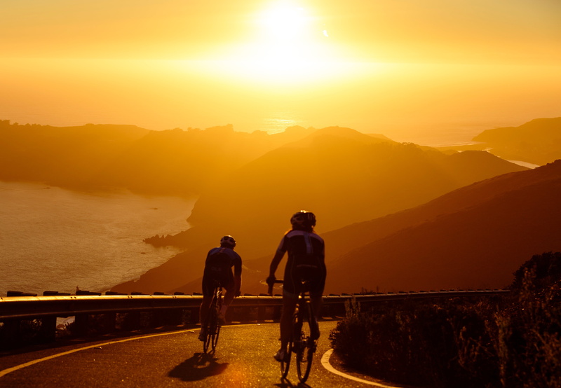 mountain, water, sunlight, outdoors, trip, adult, sun, adventure, riding, lens flare, silhouette, bikers, sunset, beauty in nature, mountain range, sea