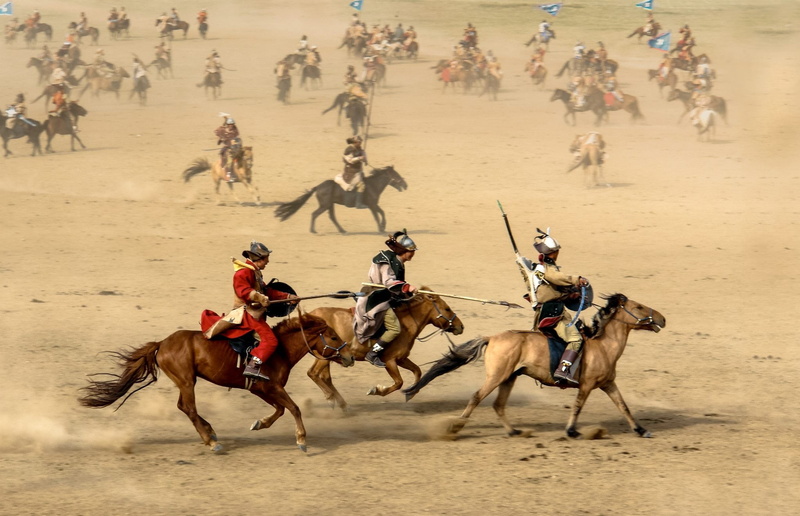 riding, pets, outdoors, working animal, area, spectator, field, domestic, mongolia, domestic animals, mammal, desert, group of animals, land, people, camel