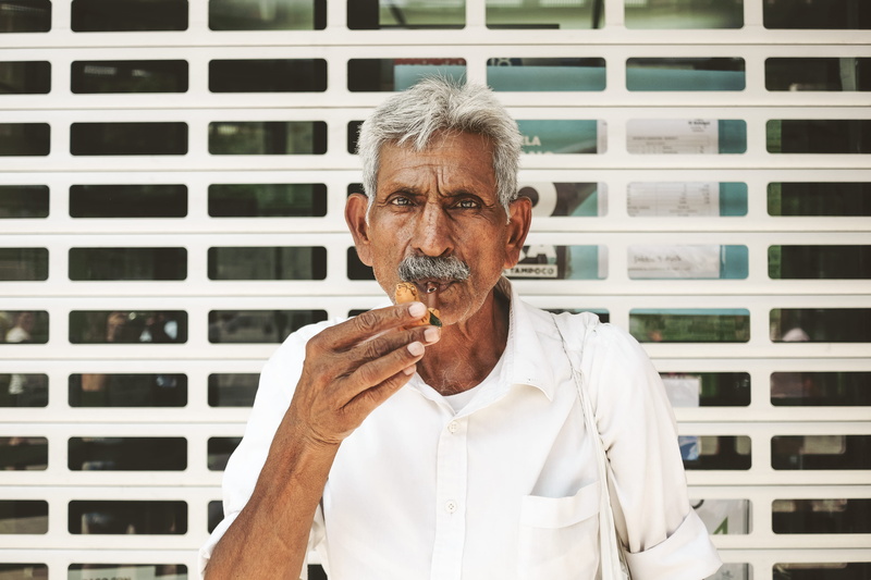 leisure activity, facial hair, shirt, white, mustache, touching, senior adult, adult, beard, males, waist up, front view, real people, holding, lifestyles