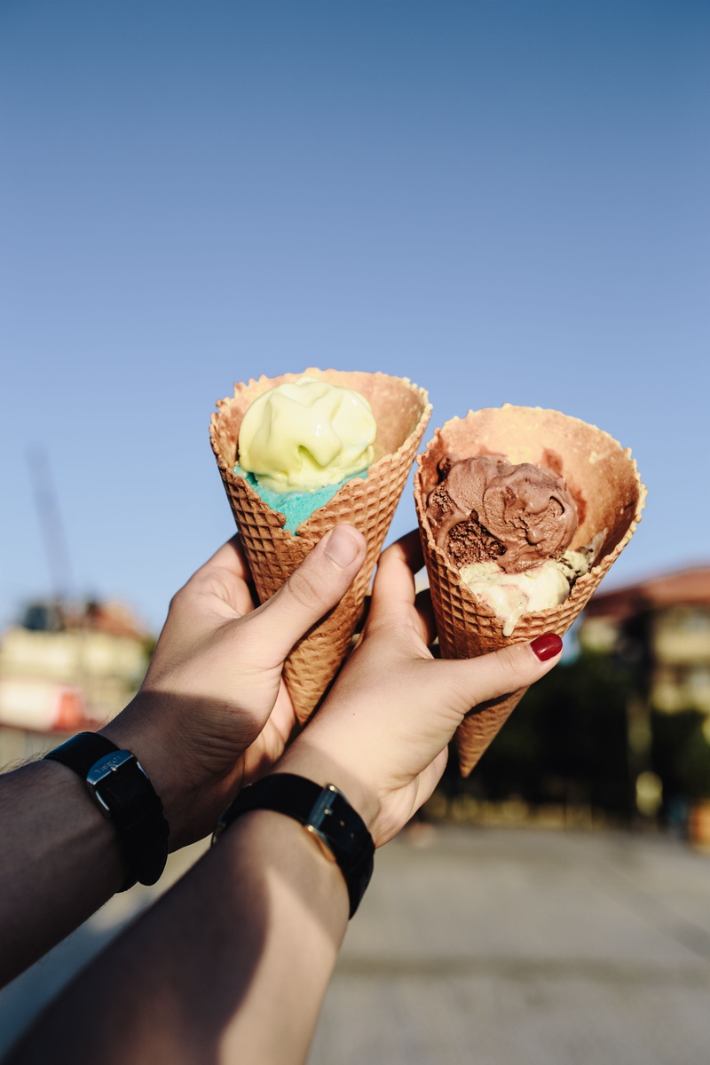 focus on foreground, human Hand, human body part, day, frozen food, food, food and drink, people, simmertime, summer, ice Cream, yummy, creams, delicious