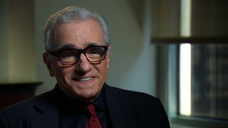 front view, hairstyle, focus on foreground, portrait, scorsese, hbo, indoors, emotion, looking at camera, actor, headshot, vinyl, smiling, adult, martin scorsese
