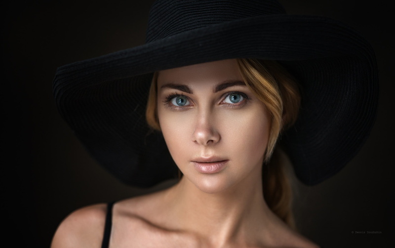 Dennis Drozhzhin, simple background, 1080P, portrait, women, blonde, looking at viewer, millinery, face, hat, blue eyes
