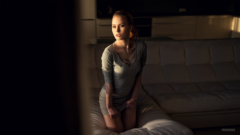 three quarter length, blonde, brunette, furniture, young women, couch, indoors, kneeling, leisure activity, young adult, beautiful woman, real people, hairstyle