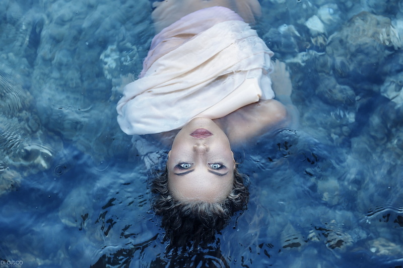 waterfront, portrait, one person, outdoors, lifestyles, face, young adult, swimming pool, top view, floating on water, pool, front view, Alessandro Di Cicco
