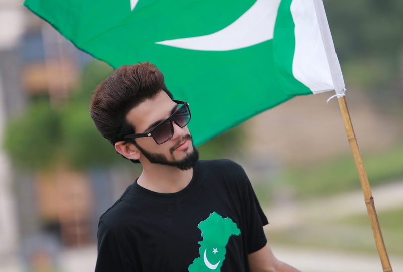 men, flag, boys fashion, real people, pakistan day, young adult, outdoors, patriotic, male model, pakistan flg, hair style, pakistan, flag holding, 14 aughust 1947