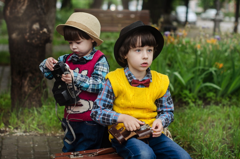 three quarter length, street, sister, family, hat, rain, men, leisure activity, kids, males, innocence, kid, 4K, togetherness, sitting, girls, females