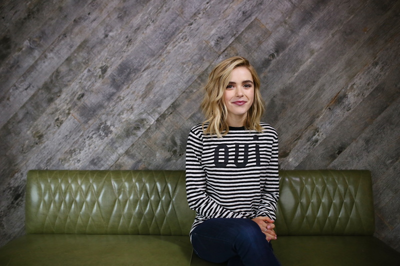 portrait, casual clothing, sitting, hairstyle, hair, blond hair, contemplation, kiernan shipka, one person, 2K, three quarter length, leisure activity