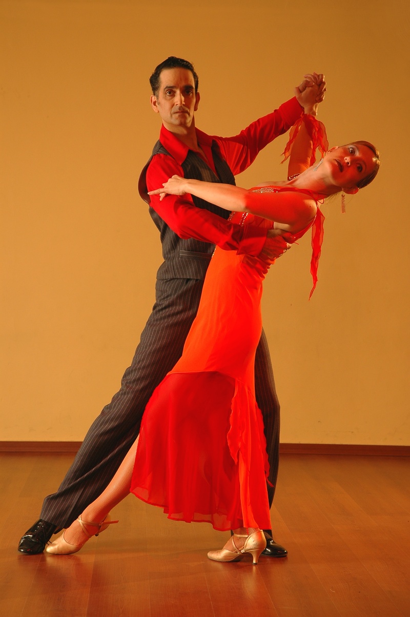 dance, dress, real people, passion, performer, dancing couple, skill, salsa dance, clothing, flooring, looking at camera, people dancing, dancing, one person