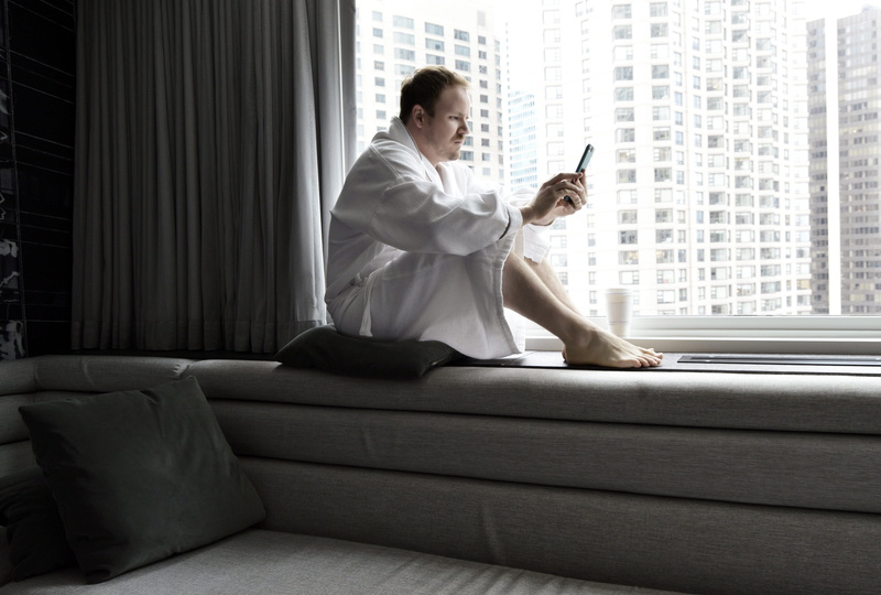 resort, caucasian, text, view, men, wireless technology, large, one person, room, white, curtains, holding, guy, full length, coffee, reading, beautiful