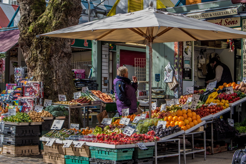 stall, adult, market stall, retail display, oranges, vegetable, lifestyles, wellbeing, norfolk, buying, one person, women, england, freshness, small business