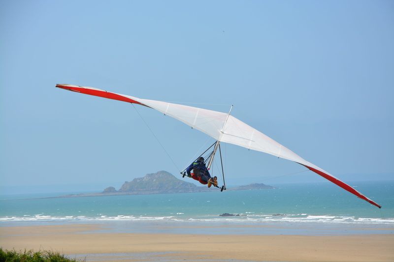 sky, water, beach, strong sensation, glider, flight, france normandy, leisure, flying, wave, one person, outdoors, sport, land, day, aquatic sport, sports activities