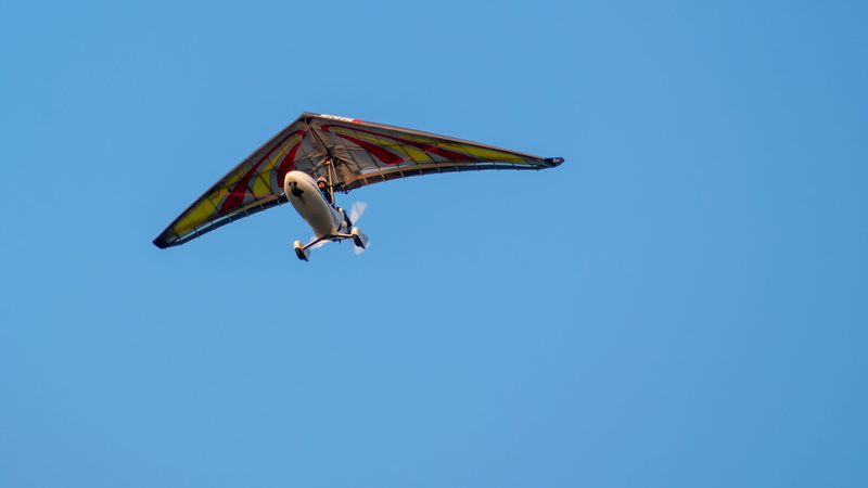 airplane, copy space, flight, flying, dom, outdoors, wings, air vehicle, clear sky, blue, adventure, 2K, low angle view, animal wing, transportation, fly