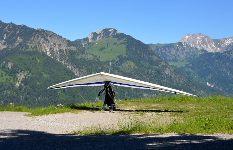scenics, courage, dom, tranquility, sunlight, Hang Glider, one person, nature, plant, Mountains, rear view, tranquil scene, full length, mountain, lifestyles