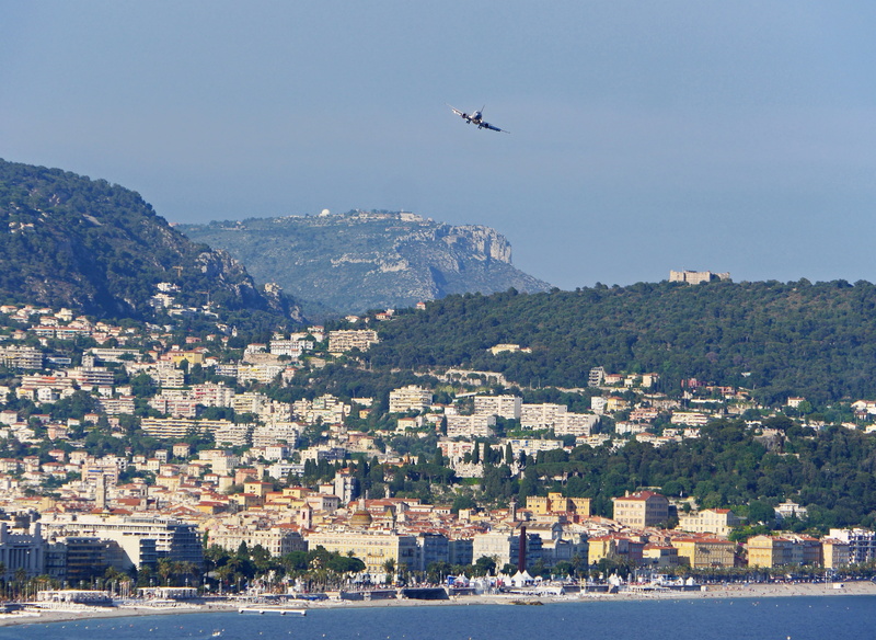 mid-air, mode of transportation, nature, building, airplane, transportation, building exterior, south of france, architecture, big city, animal wing, airport