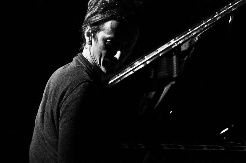 arts culture and entertainment, photos, 4K, italian, nikon d90, one person, dark, studio shot, adult, artist, collection, unsplash, playing, musical instrument