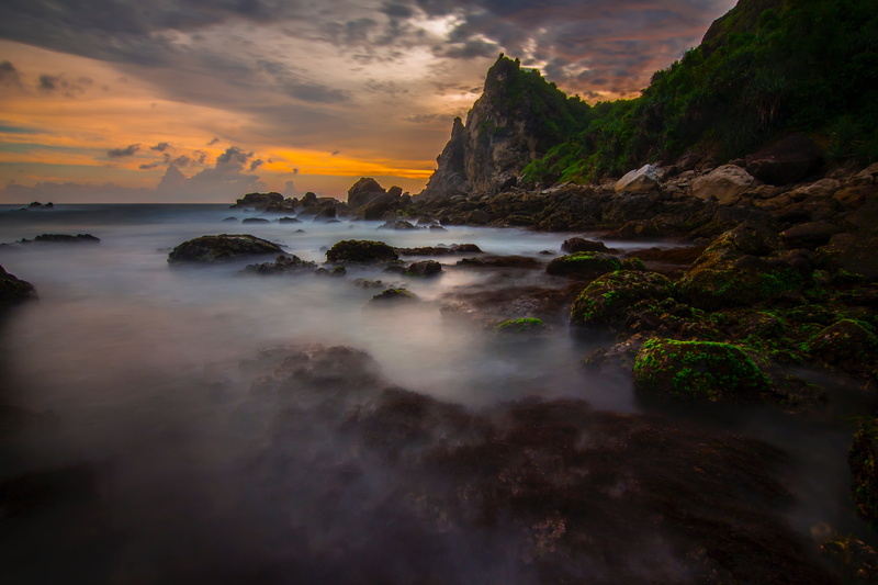 rocky coastline, sunset, horizon over water, sea, near, idyllic, clouds, beauty in nature, rock - object, cloud - sky, formation, water, land, scenics - nature