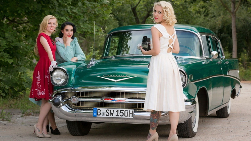 hair  , old car, car, dress, standing, 720P, couple - relationship, red, smiling, looking at camera, adult, fashion, prom, transportation, leaning, day