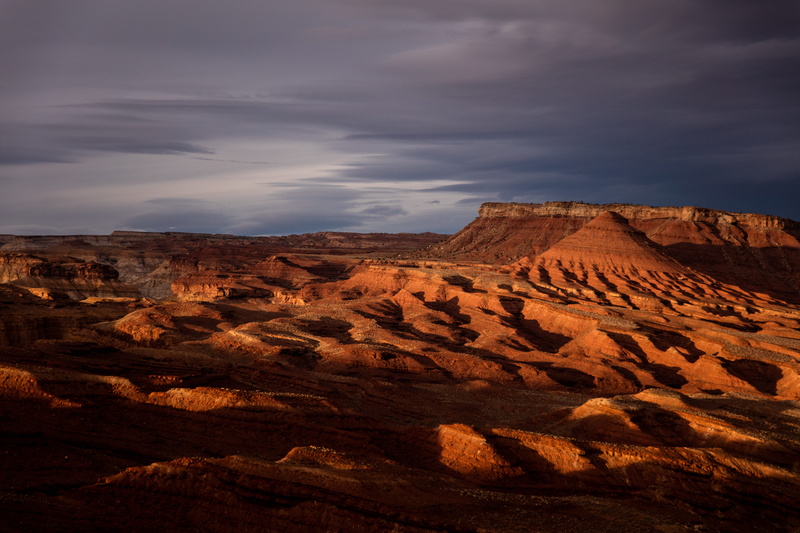 tranquil scene, red, sand, valley, san rafael swell, formation, desert, rock formation, sky, dark, sunlight, united states, purple, park, climate, arid