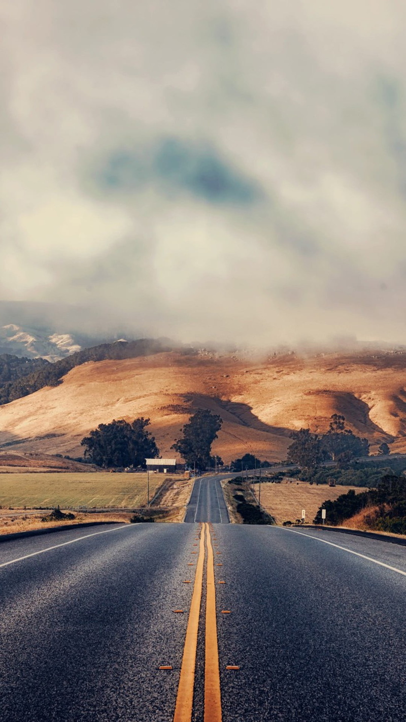 hills, sky, outdoors, beauty in nature, no people, diminishing perspective, transportation, asphalt, road marking, tranquil scene, dividing line, symbol