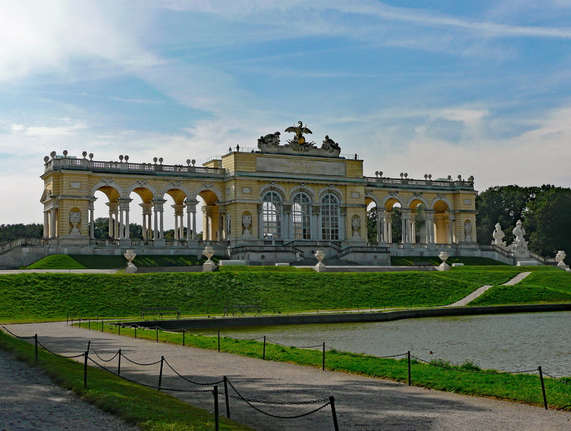 city, travel destinations, nature, palace, travel, building exterior, schönbrunn palace, arch, outdoors, tourism, lawn, the past, garden path, built structure