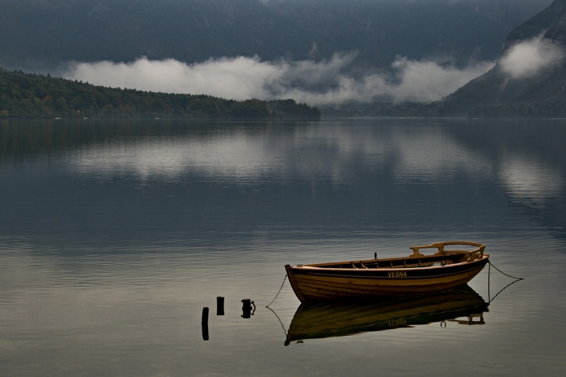 sky, tranquil scene, tranquility, outdoors, beach, lake, no people, anchored, nature, parked, water, transportation, boat, beauty in nature, fishing industry